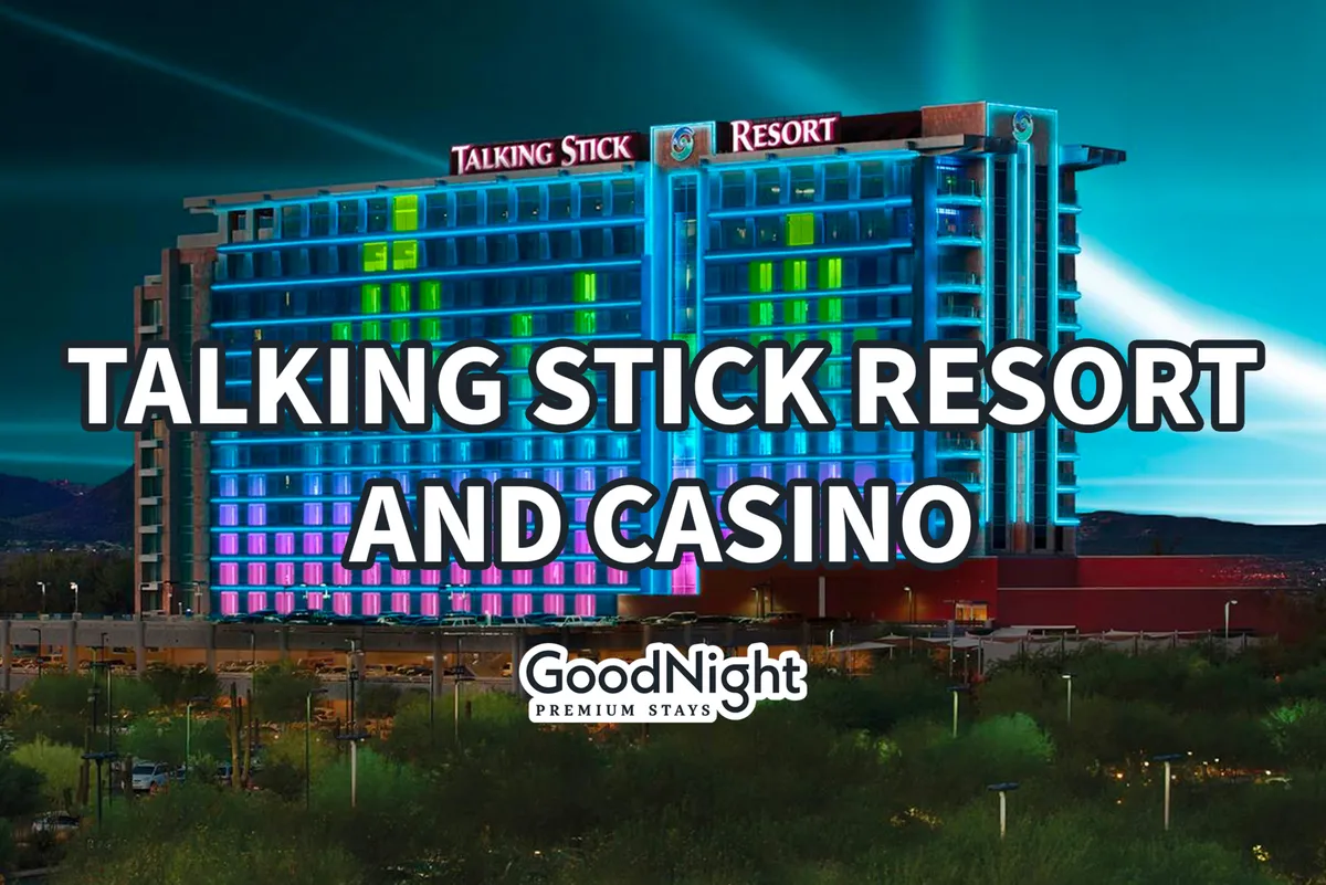 A vibrant nighttime exterior of Talking Stick Resort and Casino, with an illuminated hotel facade and colorful lighting. The scene suggests a dynamic atmosphere suitable for dining, entertainment, and evening relaxation after corporate events.